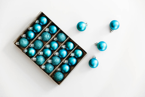 New Year 2021 blue balloons. Stylish set of shiny christmas balls. Holiday concepts. Flat lay, top view. - 写真・画像