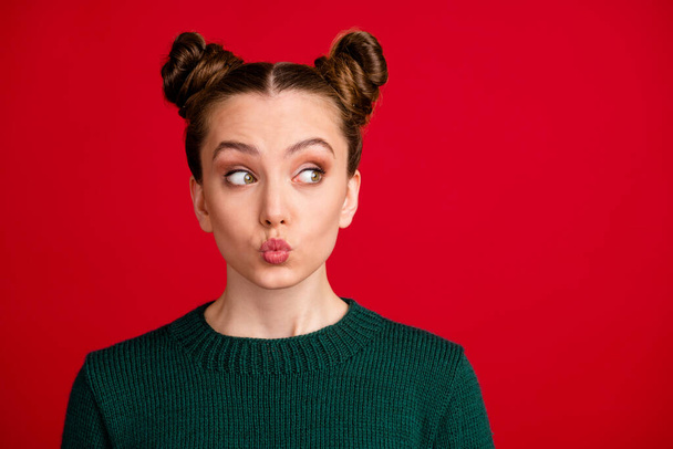 Close-up portrait of her she nice attractive pretty funky girl sending air kiss looking aside guessing idea copy space isolated over bright vivid shine vibrant red color background - Foto, Imagem
