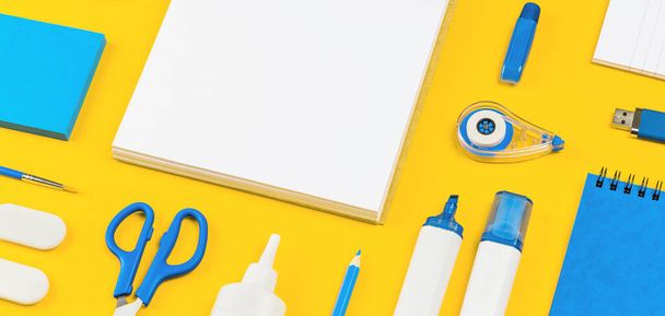 Assorted office and school white and blue stationery on bright yellow background. Organized knolling for back to school or education and craft concept. Selective focus. Banner. Copy space - Fotó, kép