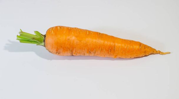 Large, fresh carrot isolated on a white background - Photo, Image