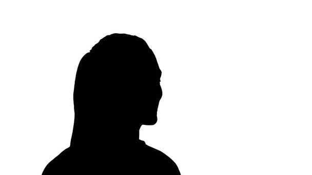 Silhouette Beautiful call center operator with headset talking. - Photo, image
