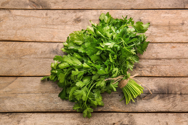 Fresh parsley on wooden background - Photo, Image