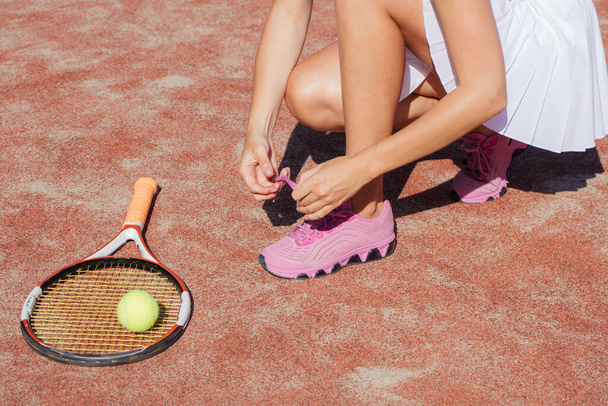 Legs of female tennis player.Close up image. - Fotografie, Obrázek