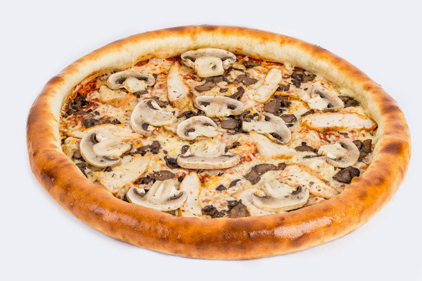Pizza with mushrooms shot on a white plate close up - Фото, зображення