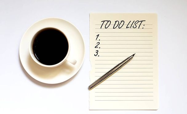 To Do List - white paper with pen and coffee on the white background - Photo, Image