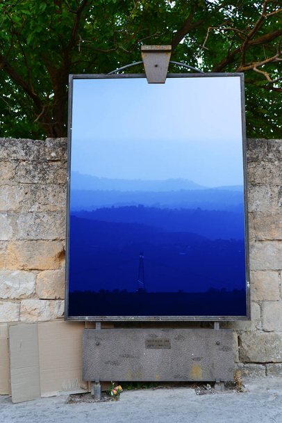Notice board for poster posting.Mountains summer landscape with blue colors gradient of mountain peaks, nature travel outdoor background. - Fotó, kép