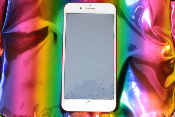 Nizhny Novgorod, Russia - September 11, 2020: broken screen of iPhone 8 plus phone, broken glass many small fragments on the monitor need repair - Φωτογραφία, εικόνα