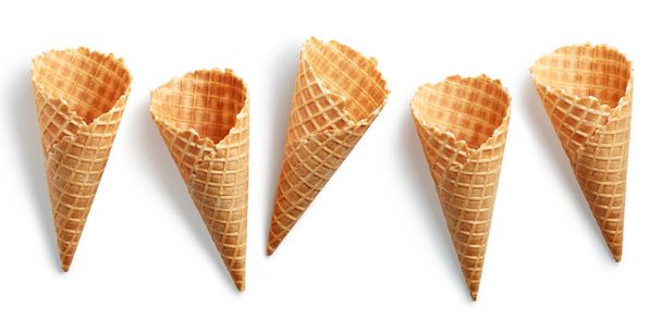 Set of empty ice cream cones isolated on white background, top view - Foto, Imagem