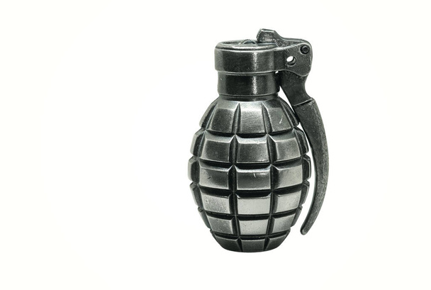 Single silver metal grenade - lighter isolated on white background with shadow and copy space - Photo, Image