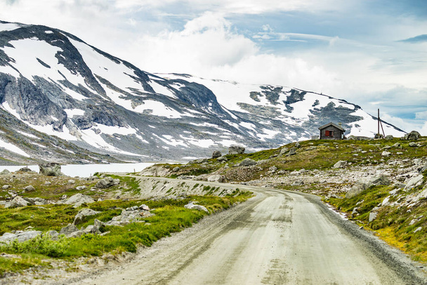 Mountains landscape and old road, national tourist scenic route Gamle Strynefjellsvegen, Southern Norway. Travel and adventure. - Fotoğraf, Görsel