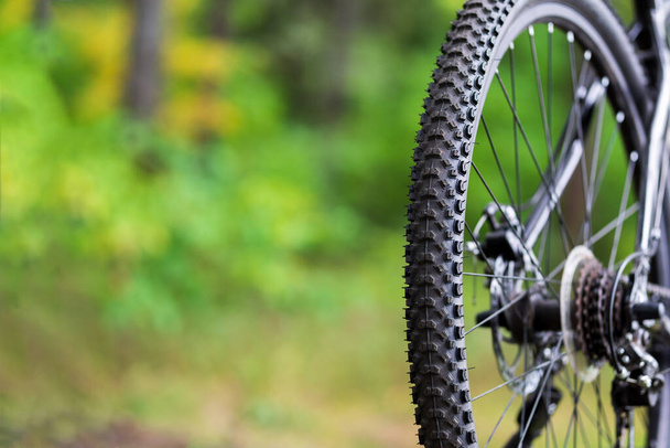 Close-up of Bicycle mud tire . Rear wheel of mountain bike - Фото, зображення