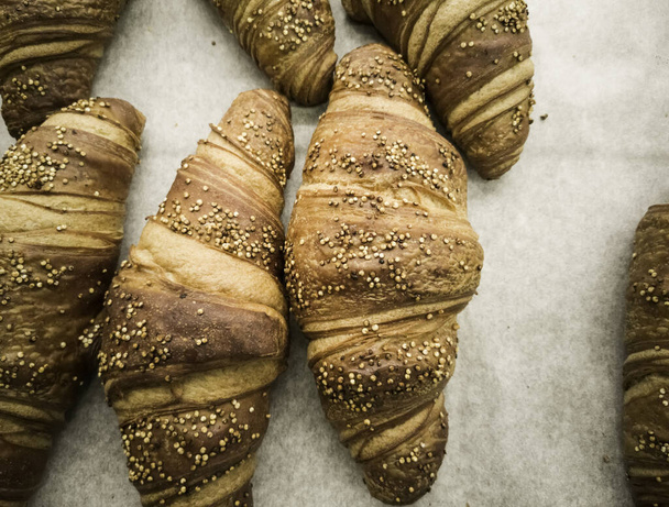 Wholegrain croissants with seeds in pastry, breakfast and dessert - Photo, Image
