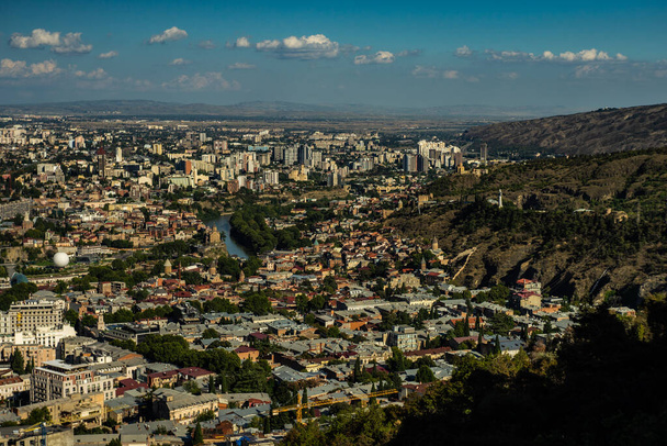Tbilisi cityscape from hilltop of Mtatsminda mountain, travel card - Zdjęcie, obraz