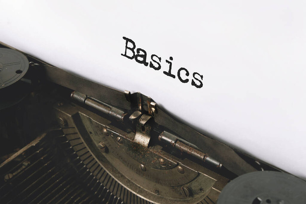 Text Back to Basics typed on retro typewriter - Foto, afbeelding