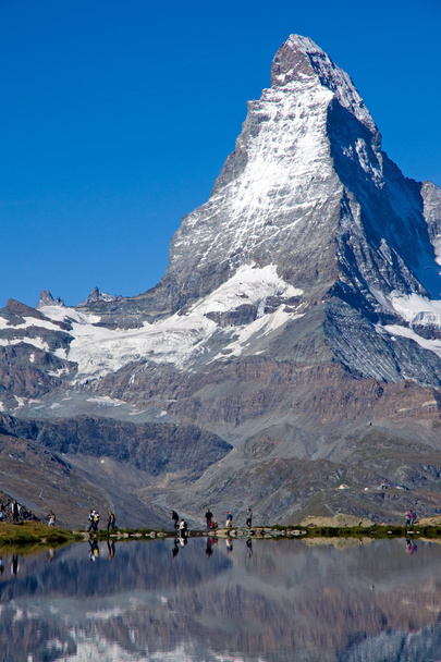 Touristen vor dem Matterhorn - Foto, Bild