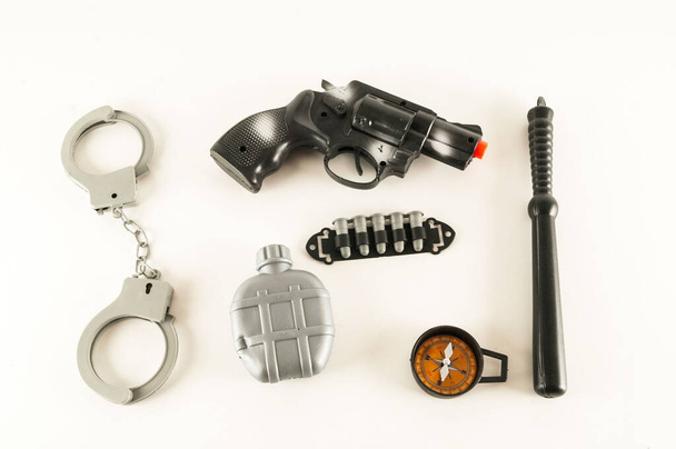 Фото игрушки с пистолетным оружием полиции - Фото, изображение
