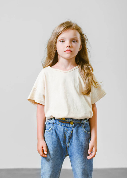 portrait of little model girl in studio - Foto, Imagen
