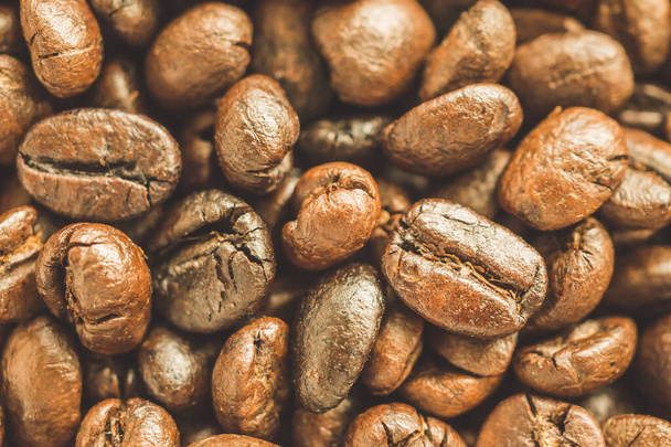 grains de café torréfiés gros plan texture fond - Photo, image