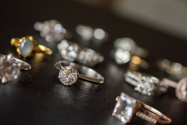 Jewelry diamond rings set on black background close up - Photo, Image