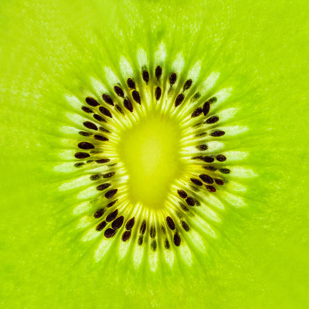 Fresh kiwi fruit slices closeup macro texture background - Foto, Imagem