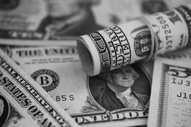United States dollar bills. Black and white. Low key. Close up. - Zdjęcie, obraz