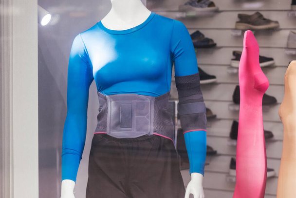 women's sports compression lingerie and belt corset taping medicine help - 写真・画像