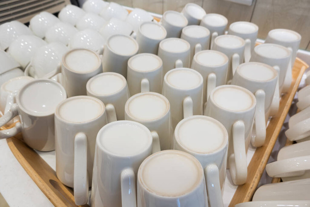 ceramic cups in a row, geometry closeup image - Photo, Image