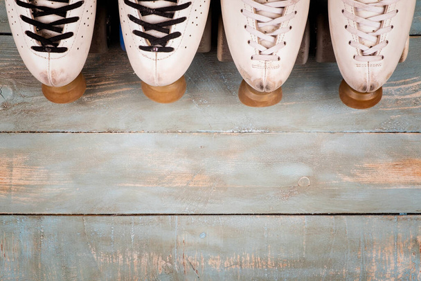 artistic roller skates on a wood background - Foto, imagen