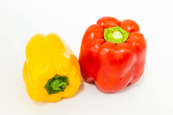 yellow and red fresh bell peppers, on white background - Photo, Image