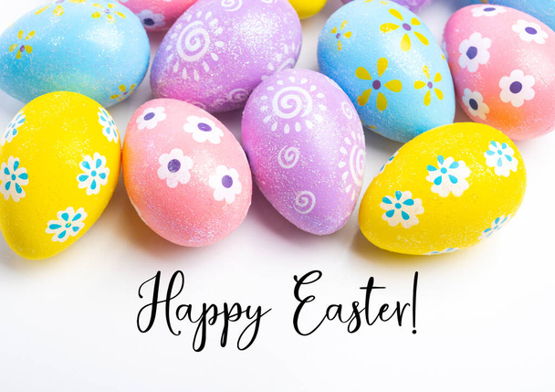 Colorful Easter eggs on white background with greeting . High quality photo - Fotó, kép
