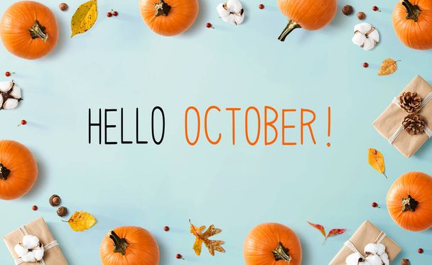 Hello October message with autumn pumpkins with present boxes - Фото, зображення
