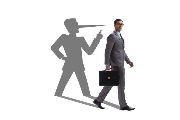 Concept of businessman liar with his shadow - Photo, Image