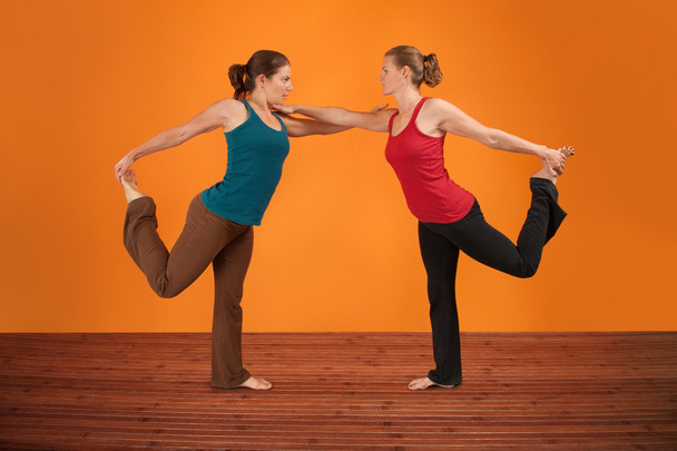 Two Women Perform Yoga - Fotoğraf, Görsel