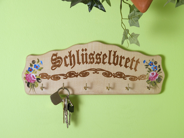 The photo shows a countrified key holder - Photo, Image