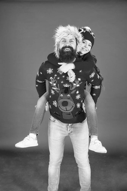Merry christmas. Family celebrate holiday. Happy family hug. Bearded man and kid. Best wishes from us with daddy. Family tradition. Winter holidays. Father daughter winter sweaters celebrate new year - Φωτογραφία, εικόνα
