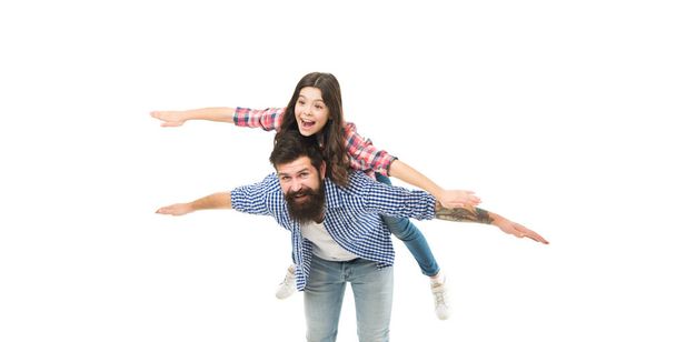They are on one way dream. Happy family dream of flying. Bearded man and little child play in photo studio. Dream vacation. Childhood dream. Travelling by plane. Holidays and vacation - Photo, image