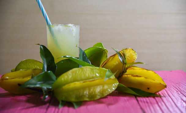 Star fruit juice (Averrhoa carambola). Carambola has a large amount of essential nutrients for health. Fruit that has a distinct shape and comes from the territory of Indonesia and Sri Lanka. - Photo, Image
