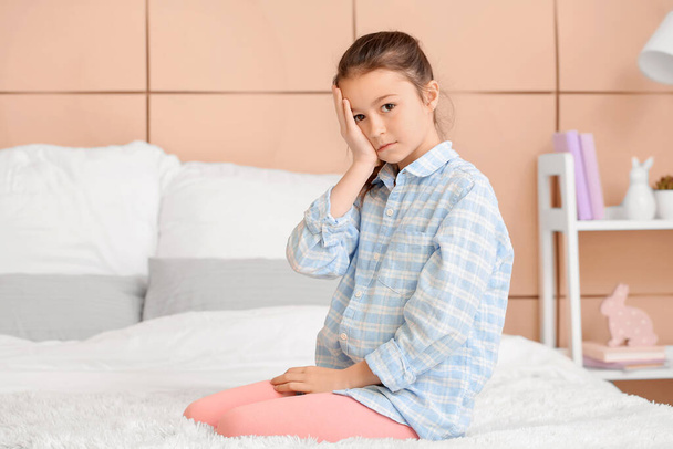 Little girl suffering from sleep disorder in bedroom - Φωτογραφία, εικόνα