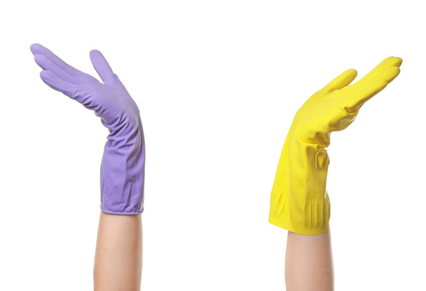 Руки в гумових рукавичках на білому тлі
 - Фото, зображення