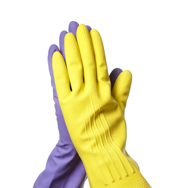 Χέρια σε λαστιχένια γάντια σε λευκό φόντο - Φωτογραφία, εικόνα