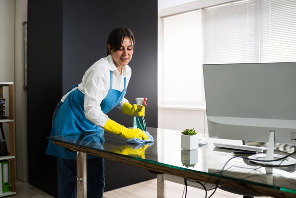 Janitor Cleaning Office Desk. Hygiene Cleaner Service - Фото, изображение