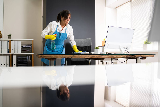 Janitor Cleaning Office Desk. Hygiene Cleaner Service - Photo, Image