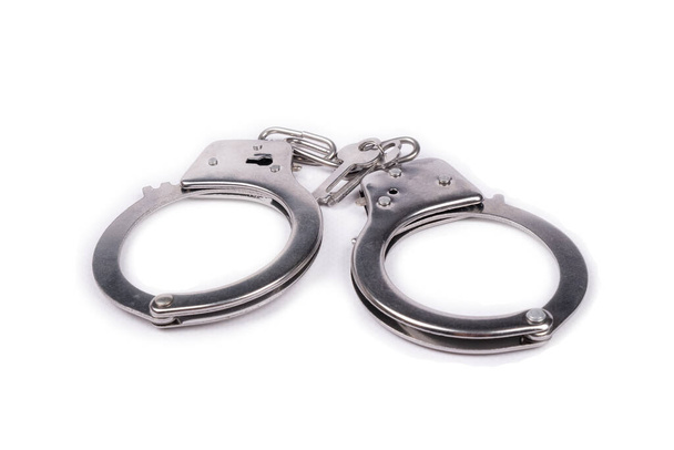 наручники изолированы на белом фоне - Фото, изображение