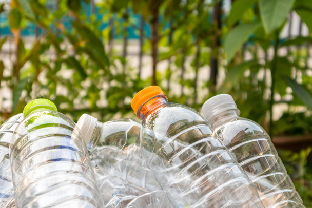plastic bottles in brown recycle garbage box - Fotografie, Obrázek