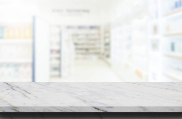 Imagem abstrata da mesa de pedra de mármore fundo grunge textura superior com imagem embaçada dentro da farmácia ou farmácia no fundo. - Foto, Imagem