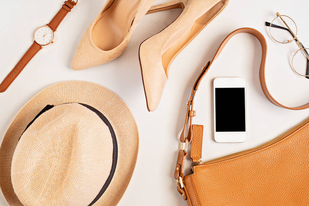 Flat lay with woman fashion accessories in neutral colors. Beauty blog, style, trends. Top view, copy space - Photo, Image
