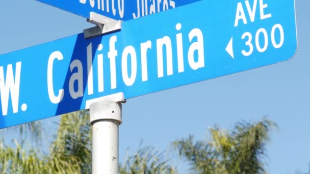 カリフォルニア州の道路標識クロスロードです。交差点標識、夏の旅行や休暇の象徴に手紙。アメリカの観光地。ロサンゼルス、ルート101付近の市内のネームボード上のテキスト - 映像、動画