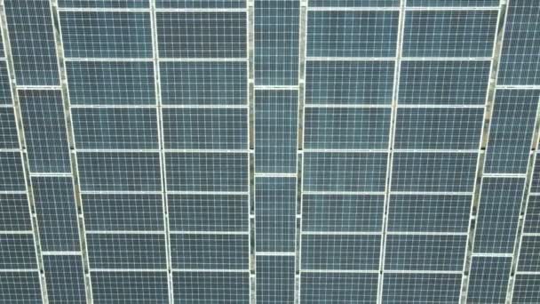 Close up top view on solar panel. Panorama of solar panels from a quadcopter. Background or texture - Footage, Video