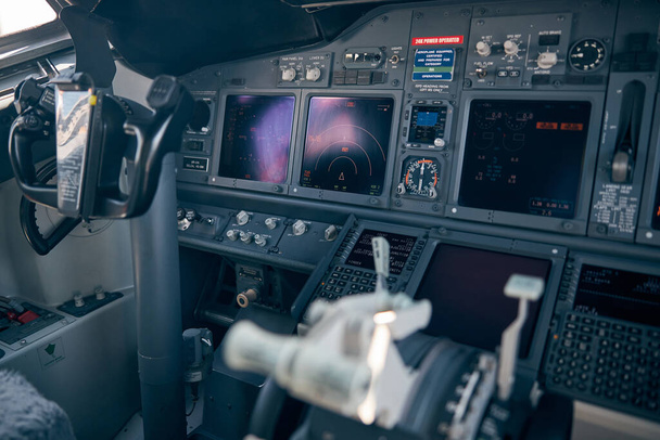Aircraft flight deck with control column and flight displays - Φωτογραφία, εικόνα