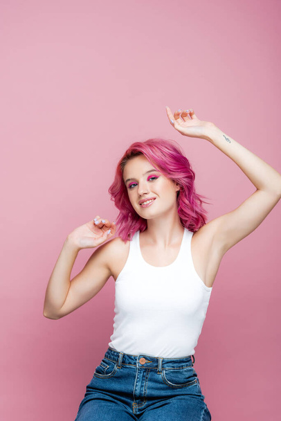 young woman with colorful hair posing isolated on pink - Fotografie, Obrázek